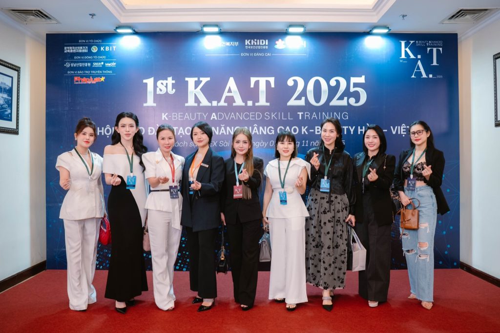 Delegates at the K.A.T 2025 welcome backdrop
